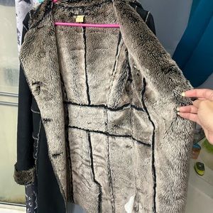 Almost brand new Venus suede coat with fur inside. Have kept inside a bag